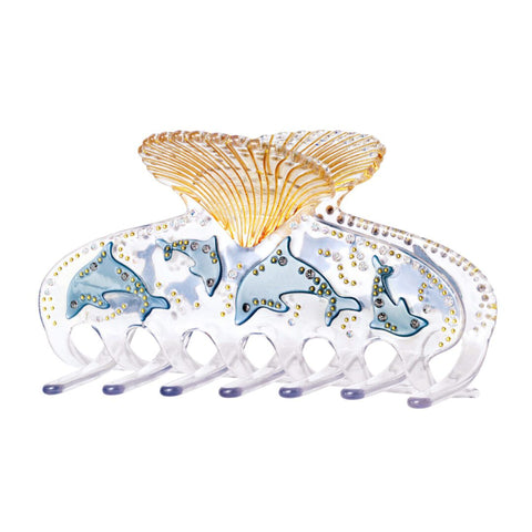 Fin hårklemme fra Maaensten med delfiner springene.