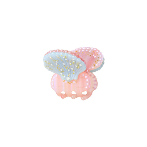 Sødeste Kotilo hårklemme designet som en lille muslingeskal.