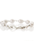 Dulong armbånd, Anello Pearl, Sølv, ANE4-F1107. Armbåndet kombinerer enkelthed og finesse og prydes af en smuk ferskvandsperle. 