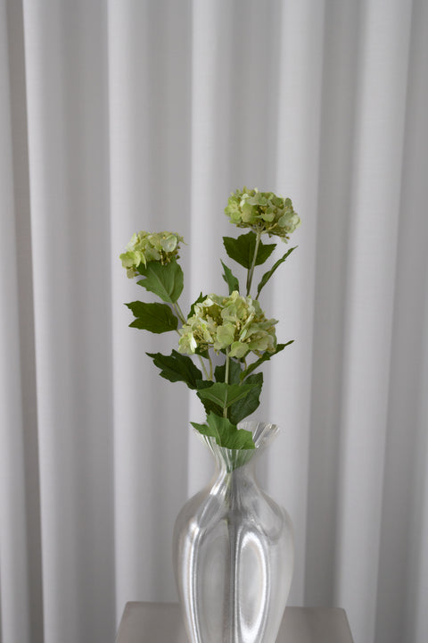 Flot naturtro falsk kunstig hortensia blomst fra bloom objects i farven naturgrøn. 